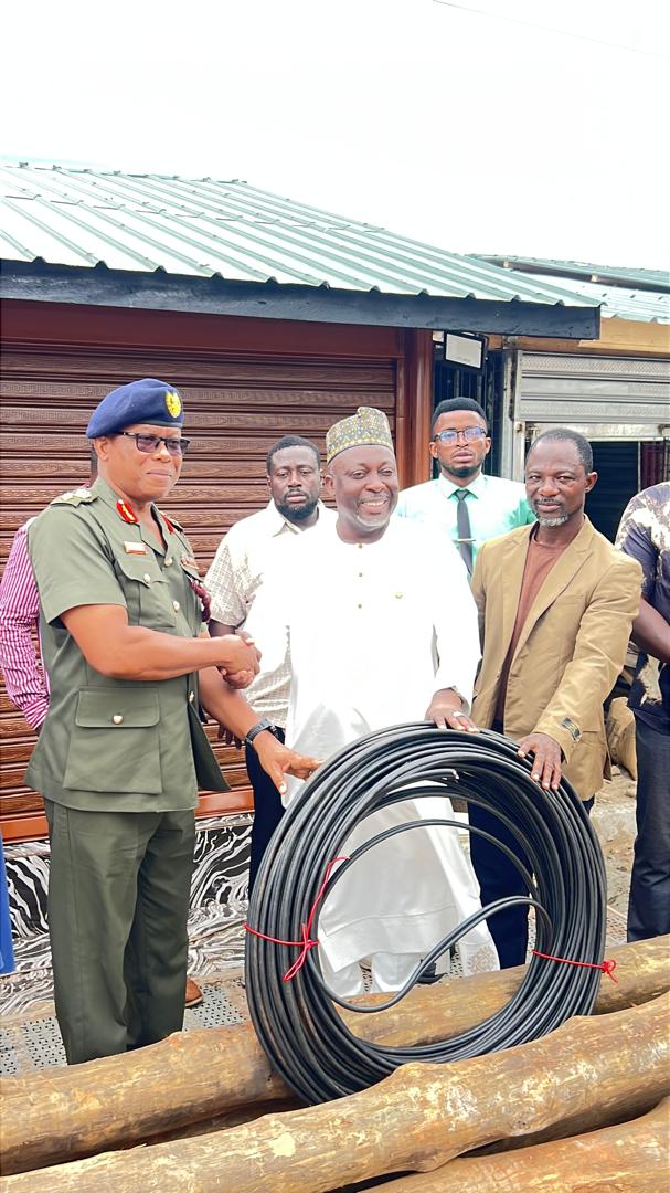 Hon. Baba Jamal Supports Reconstruction of 37 Military Hospital with Donation of Treated Teak Poles